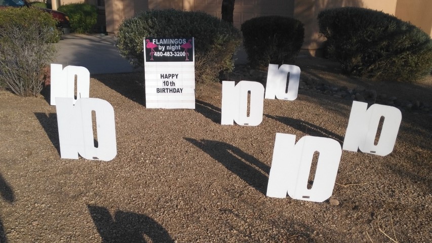 Birthday yard sign greeting of big number 10s near New River AZ