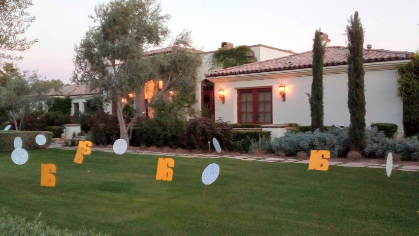 Big number 16s with golf balls in happy birthday party decorations near Biltmore Arizona