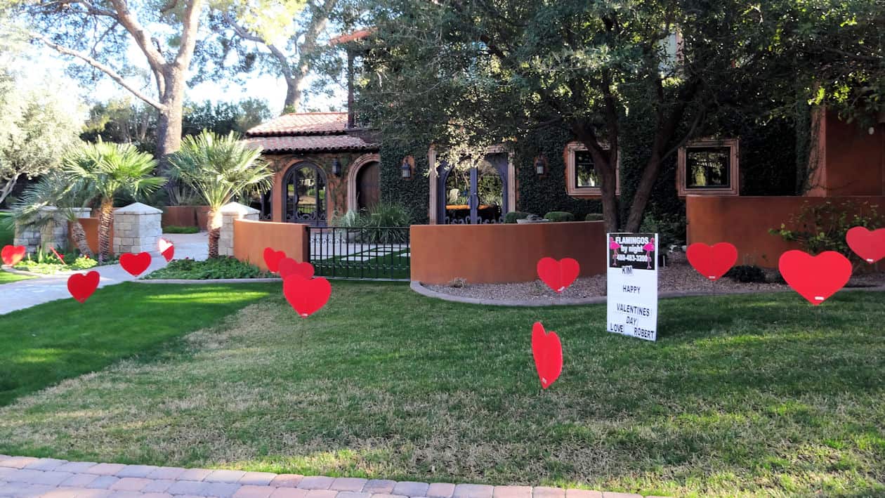 30 big red heart yard signs in a special anniversary gift for her near Tempe