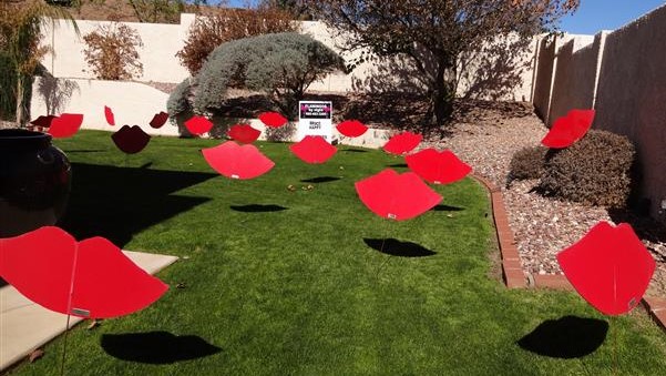 Fathers Day lawn display of giant red lips