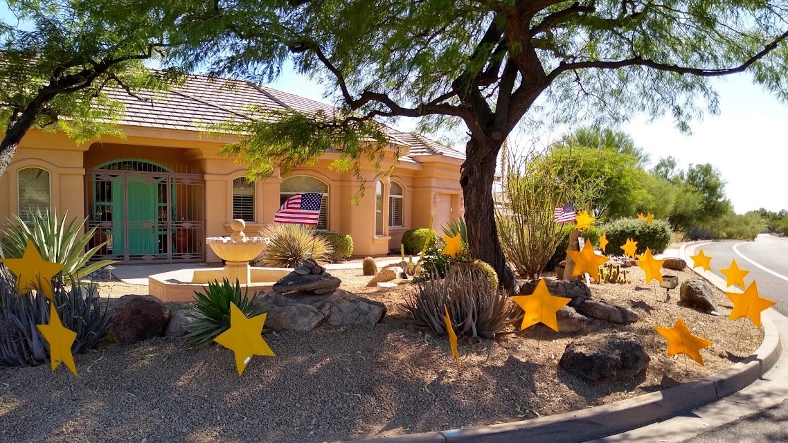 stars & flags in yard for July 4th party decorations. Scottsdale