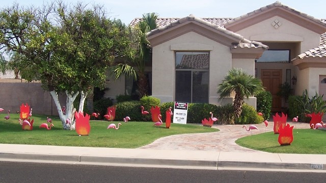 Hot Stuff birthday yard sign display - 30 flames and flamingos - near Mesa AZ