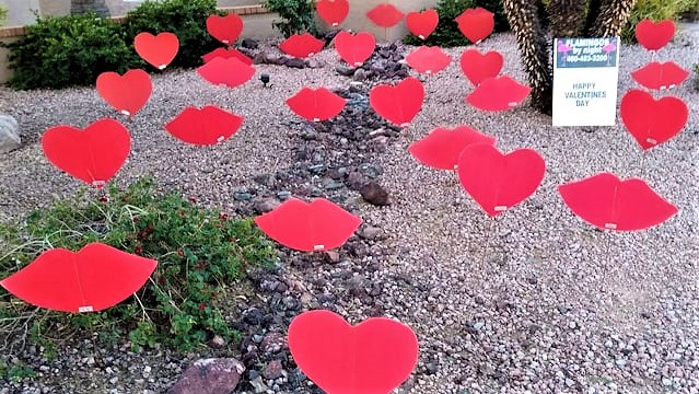 30 big red hearts & kisses in anniversary desert yard display in Cave Creek