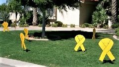 30 Yellow ribbons  (34' tall 16' wide)