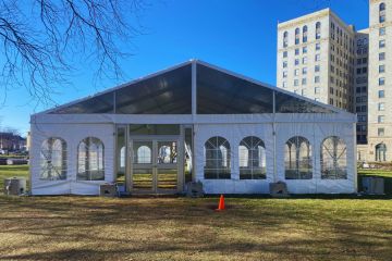 Structure Tent Rental in field in Sterling Heights