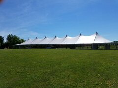 40ft X 140ft (5600 sq ft) Pole Tent on Grass Only 